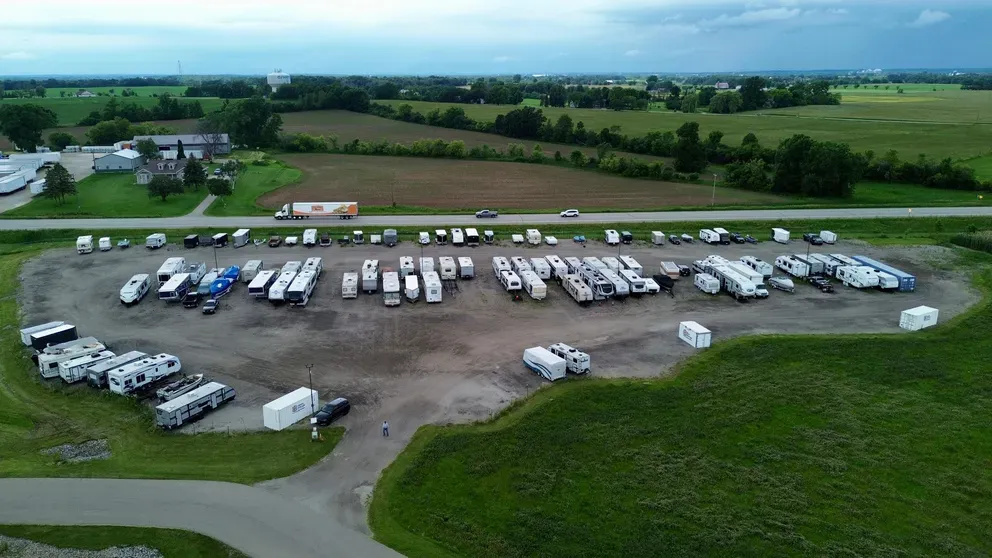 Parking area at storage facility with rv and car parking